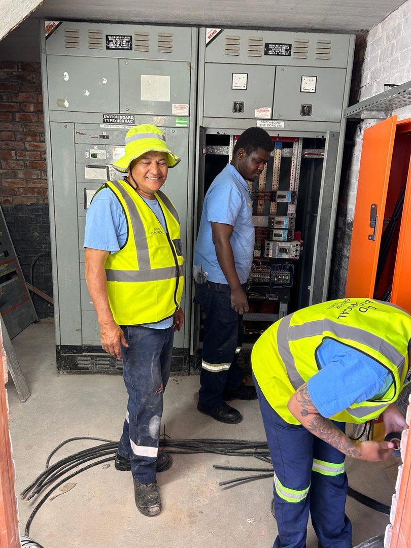 DJVD team working on an industrial main switchboard