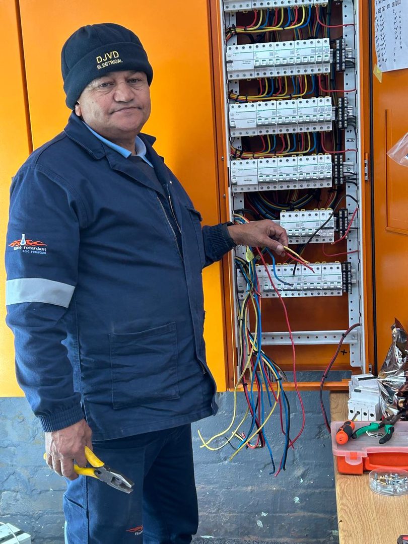 DJVD electrician at a commercial distribution board